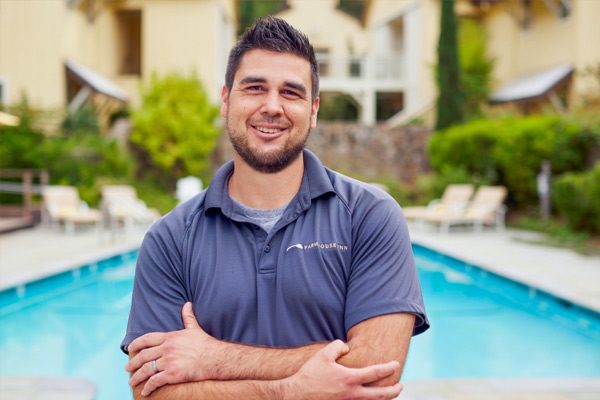 Chris Barrett in front of the Farmhouse Inn pool
