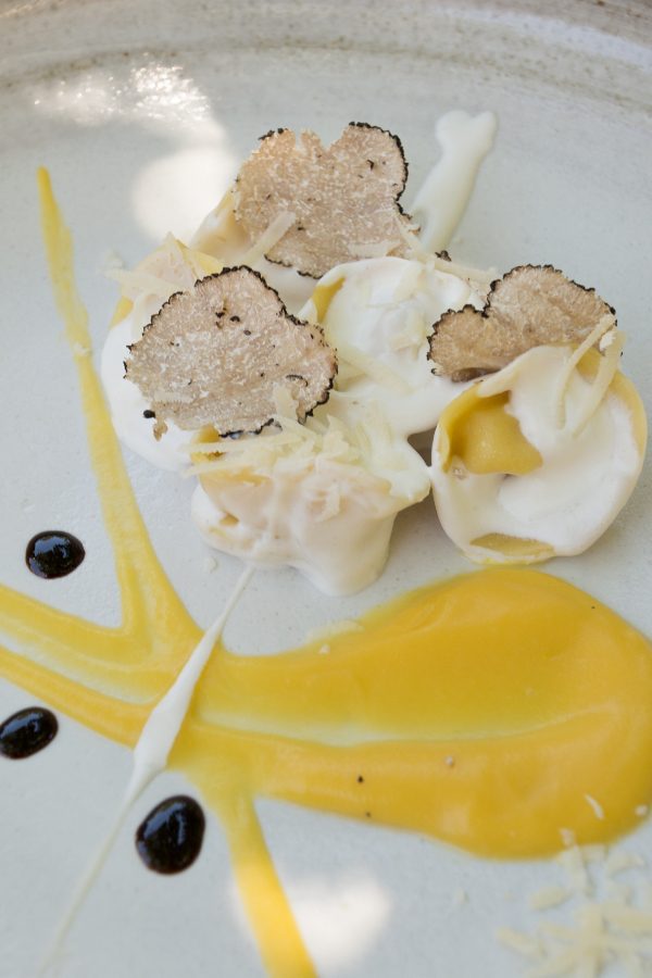 close-up of dish of Tortellini With Truffles, with elegant plate dressing