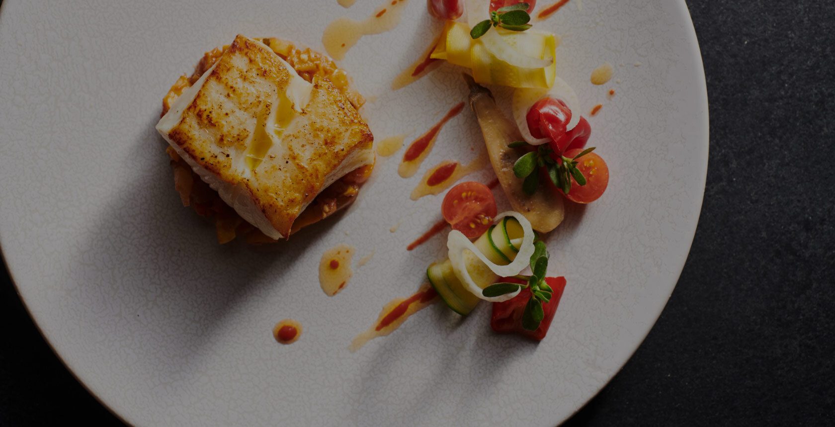 close-up aerial view of elegant dish of food from Farmhouse restaurant.