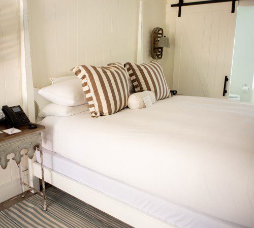 Cottage bed with fresh sheets